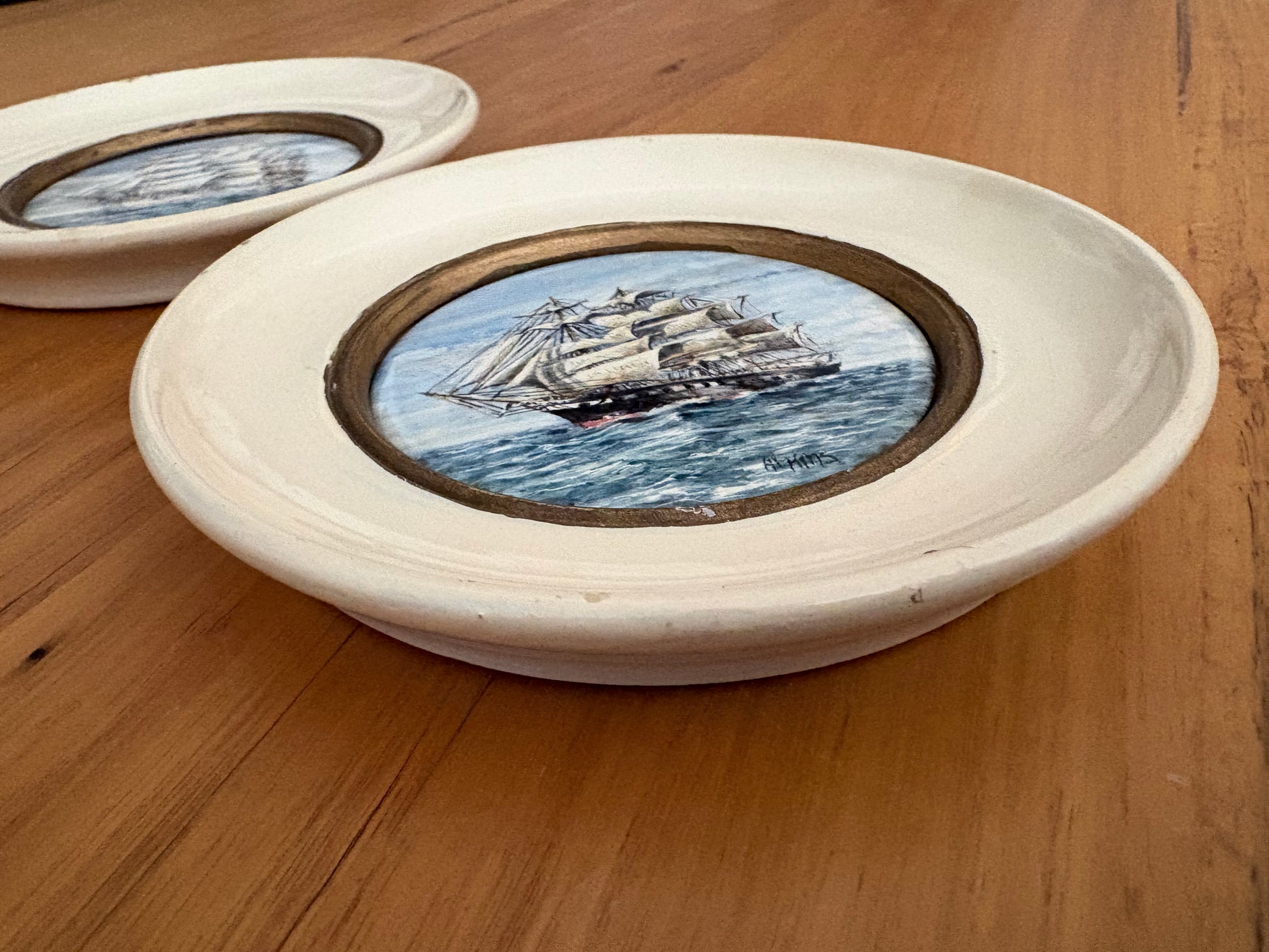 Pair of original hand painted ceramic ship artworks, signed, framed, vintage