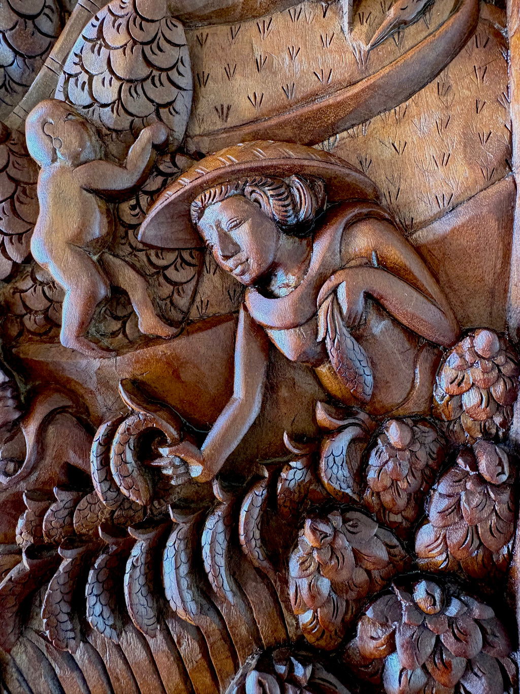 Traditional Balinese teak wood carving, harvest, vintage art