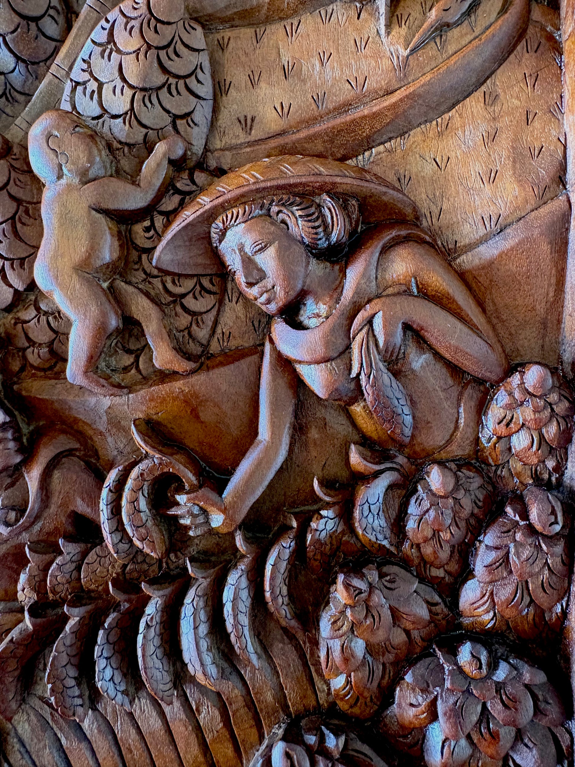 Traditional Balinese teak wood carving, harvest, vintage art