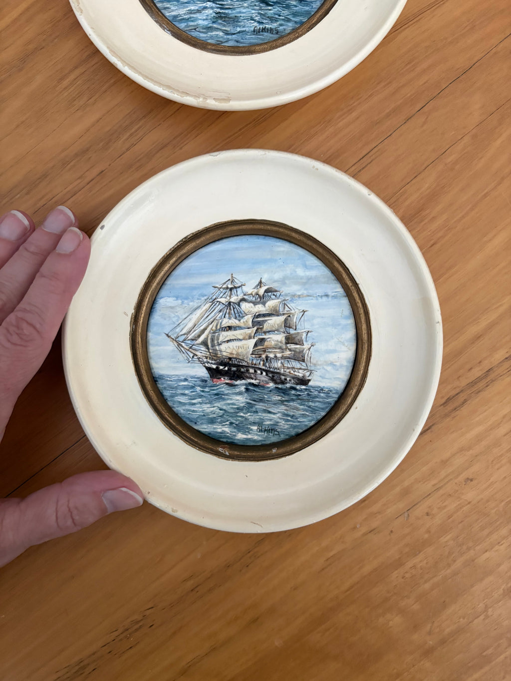 Pair of original hand painted ceramic ship artworks, signed, framed, vintage