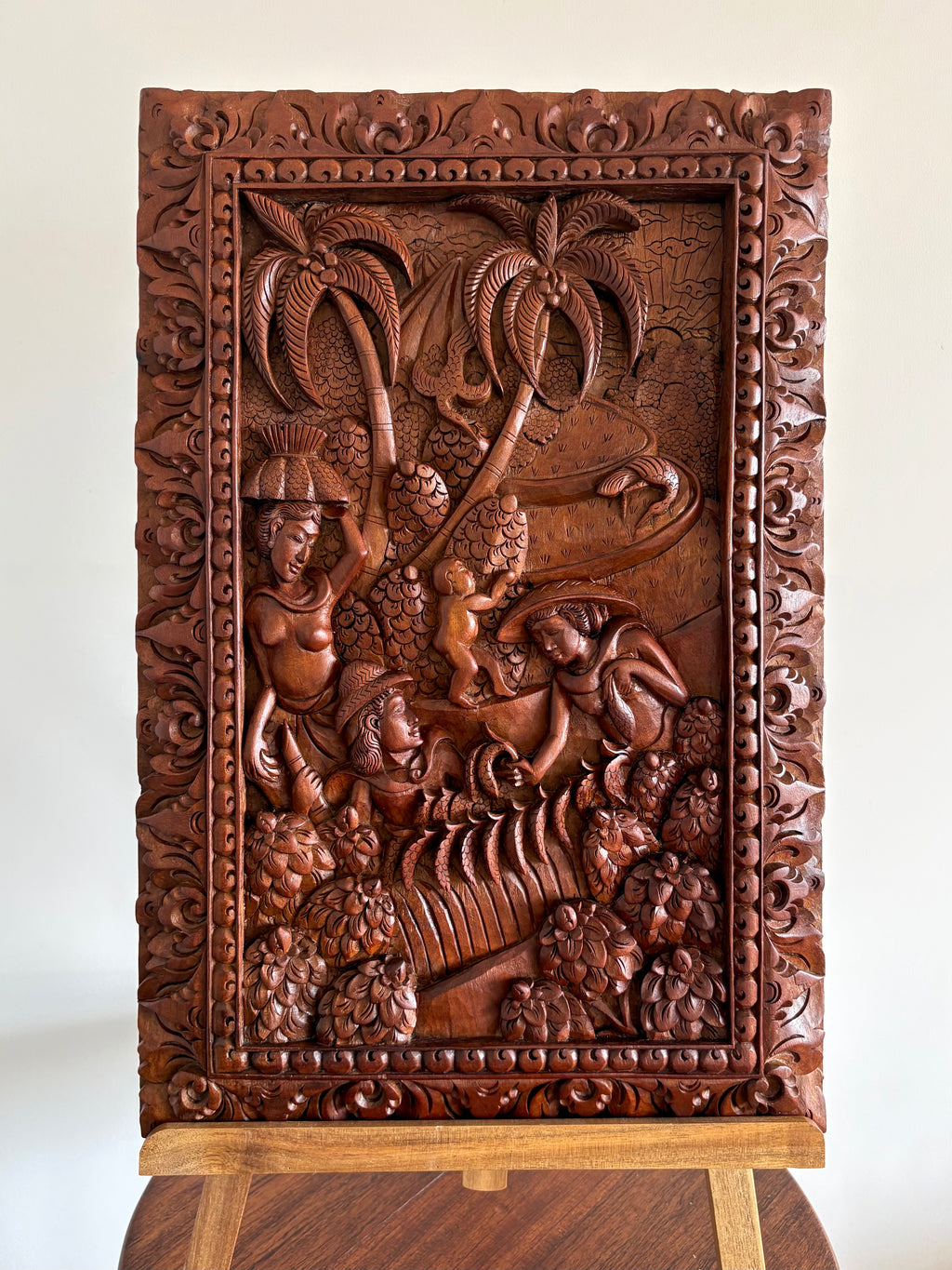 Traditional Balinese teak wood carving, harvest, vintage art