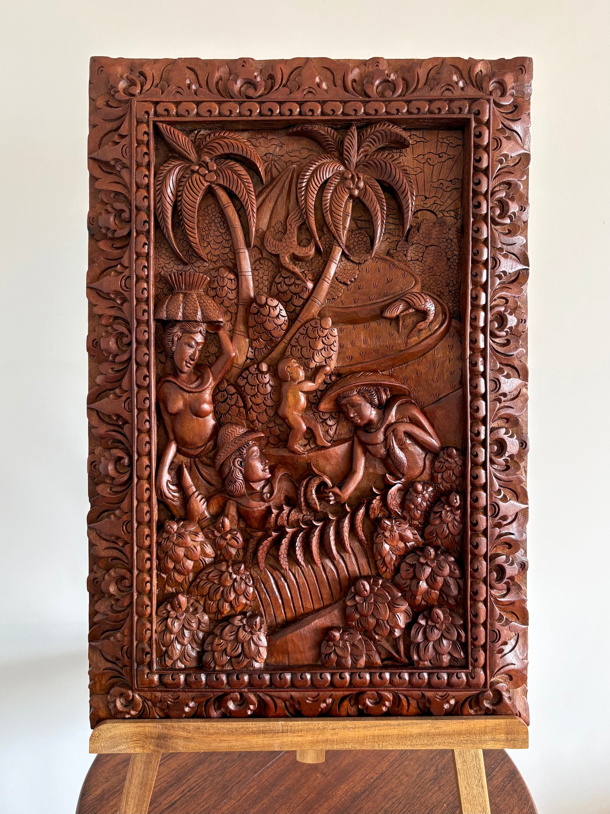 Traditional Balinese teak wood carving, harvest, vintage art